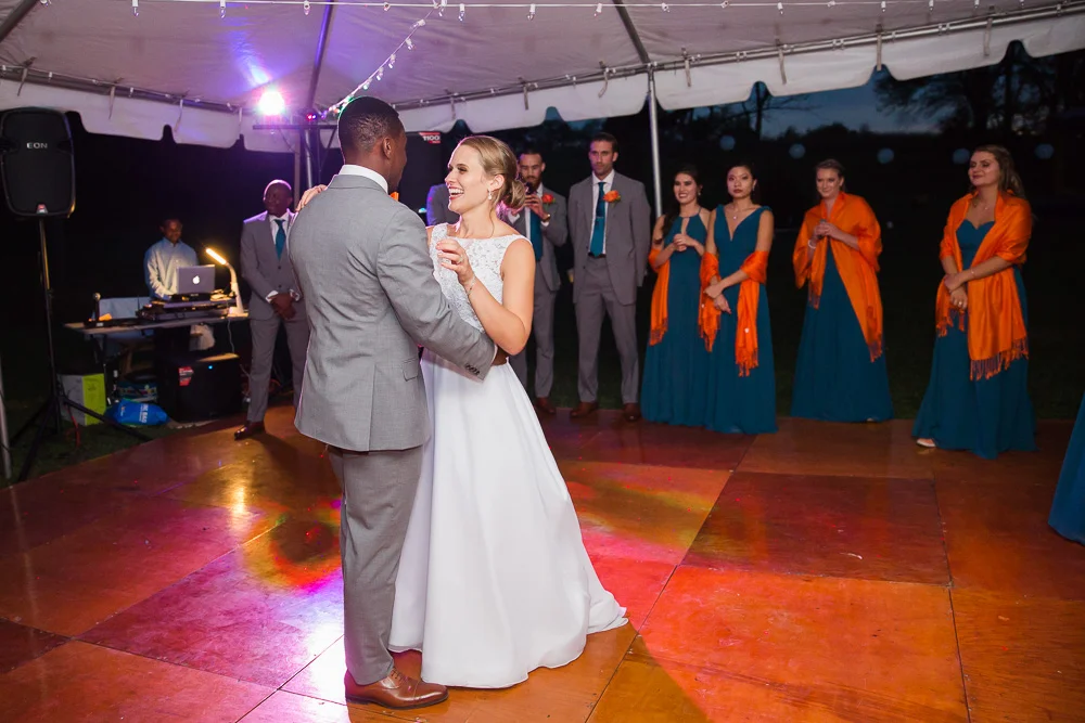 Bride and groom first dance under the tent