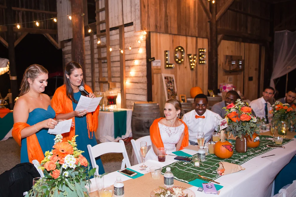 Bridesmaids giving a toast under the barn at Mountain Run Winery | Best Barn Wedding Venues in Culpeper, Virginia