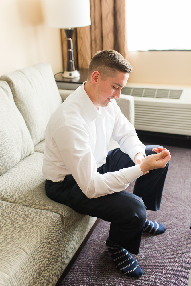 Groom getting ready at The Strathallan Hotel