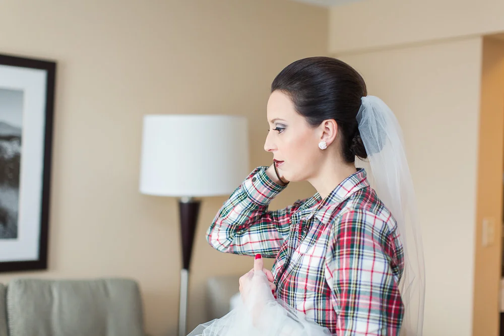 Bride getting ready for the wedding day at The Strathallan Hotel | Rochester, NY