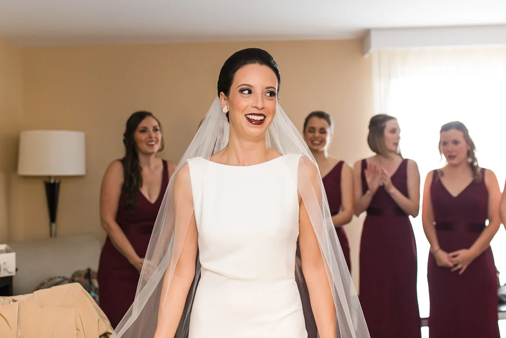 First look with the bride and bridesmaids | Wedding photography at The Strathallan Hotel, Rochester NY