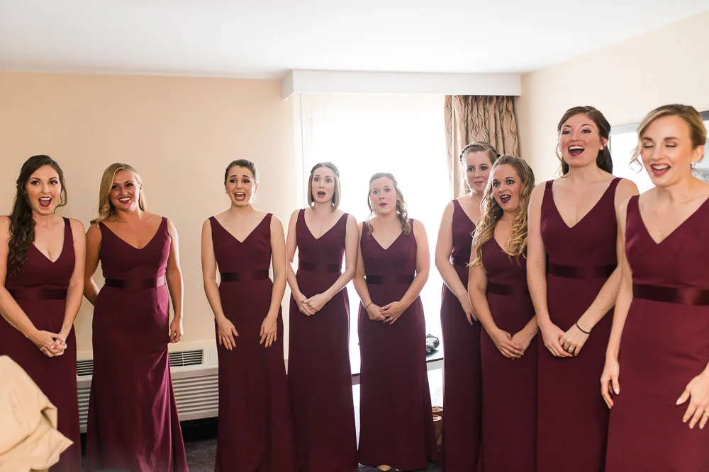 First look with the bride and bridesmaids | Wedding photography at The Strathallan Hotel, Rochester NY
