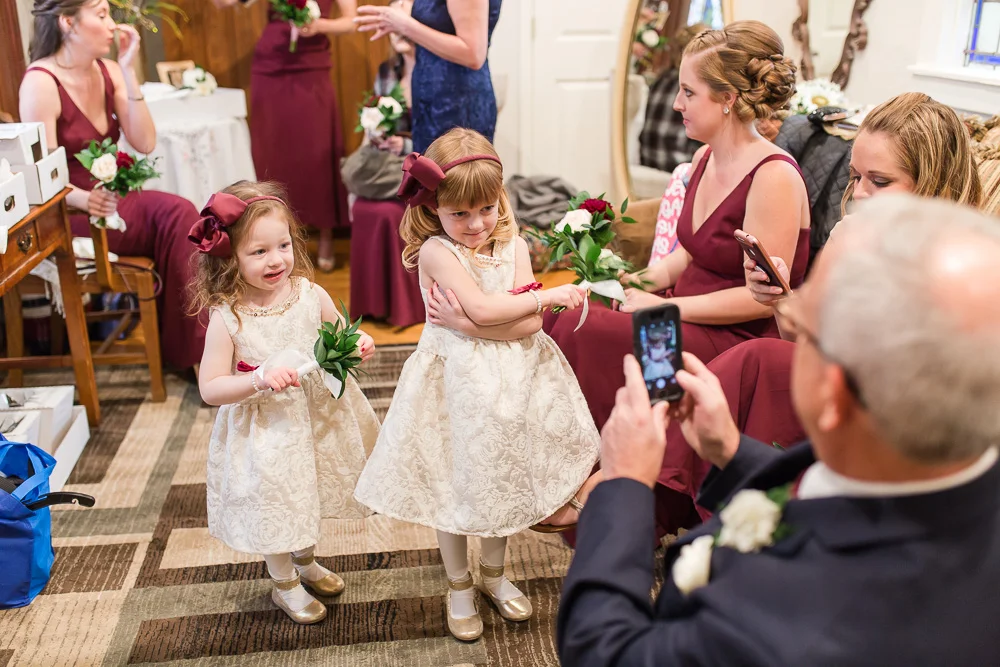 Flower girls posing before the wedding ceremony | Chapel Hill | Candid Wedding Photographer