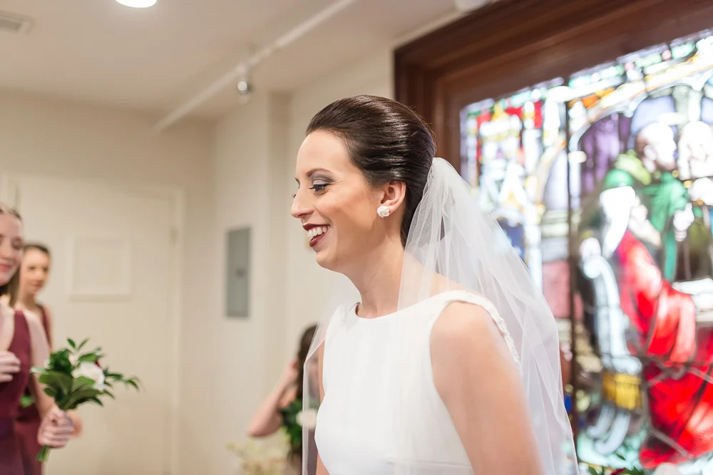 Bride getting ready in the bridal suite at Chapel Hill | Rochester NY Wedding Photographer