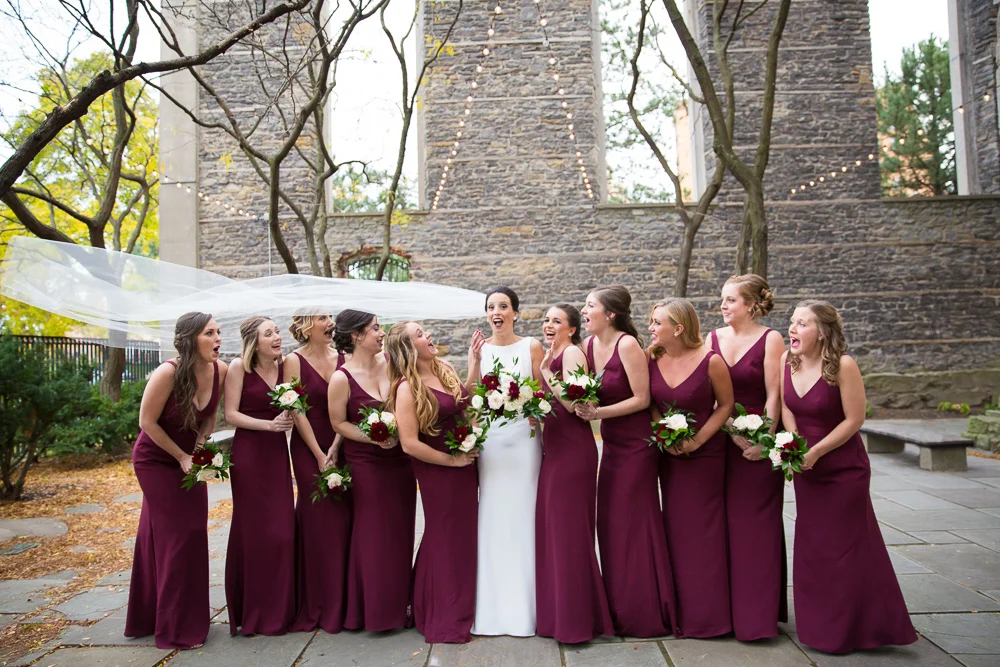 Fun Wedding Photography in Western New York | Burgundy bridesmaid dresses by Vera Wang