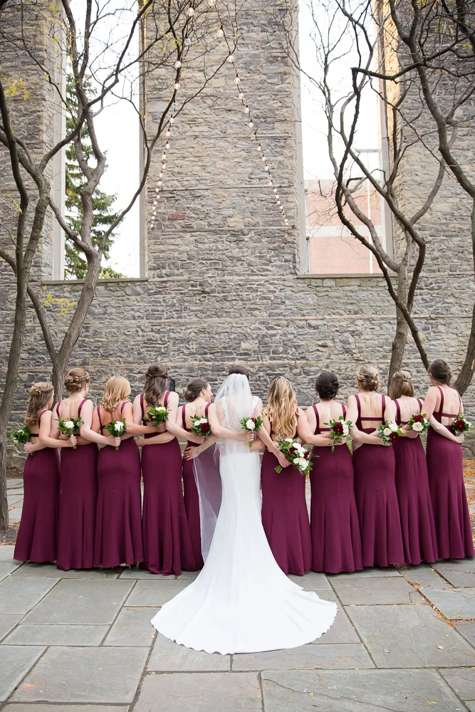 Bridal party photos at St. Joseph’s Park | Wedding dress from Pronovias at Silk Bridal Boutique | Maroon bridesmaid dresses from Vera Wang at David’s Bridal