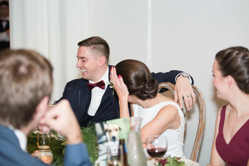 Wedding couple laughing during the reception at Arbor Loft, Rochester NY | Documentary Wedding Photography