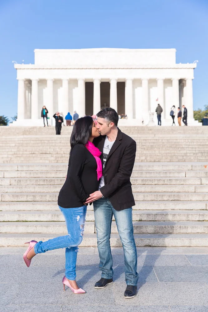 A kiss in front of the Lincoln Memorial | DC Maternity Photographer