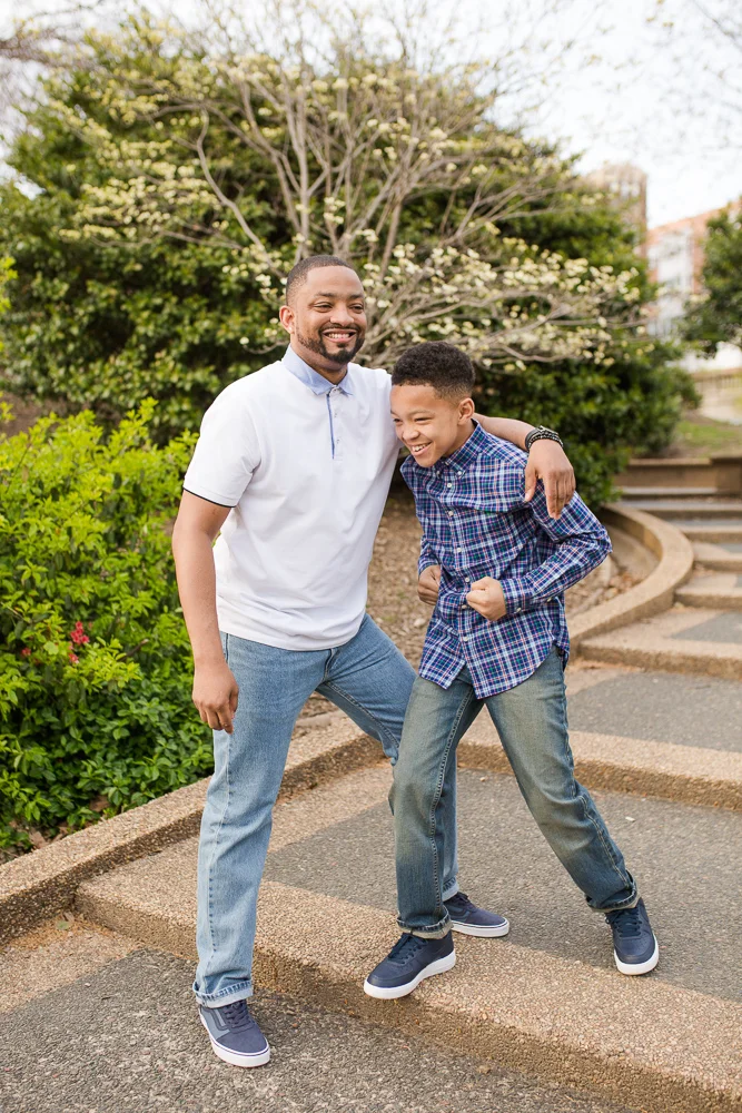 Father and son goofing around on the steps at Meridian Hill Park | Family Photography in DC