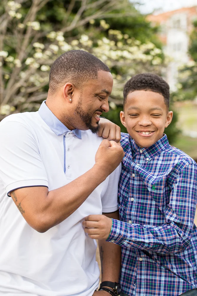 Father and son goofing around on the steps at Meridian Hill Park | Family Photography in DC