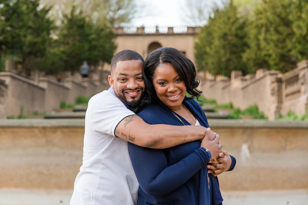 Before the proposal, hugging in front of the Meridian Hill Park fountain | Best Washington DC Engagement Locations