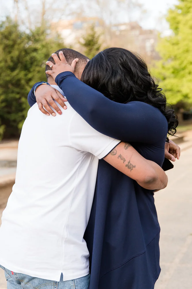 An emotional hug after she accepted the proposal and said yes | Washington DC Proposal Photography