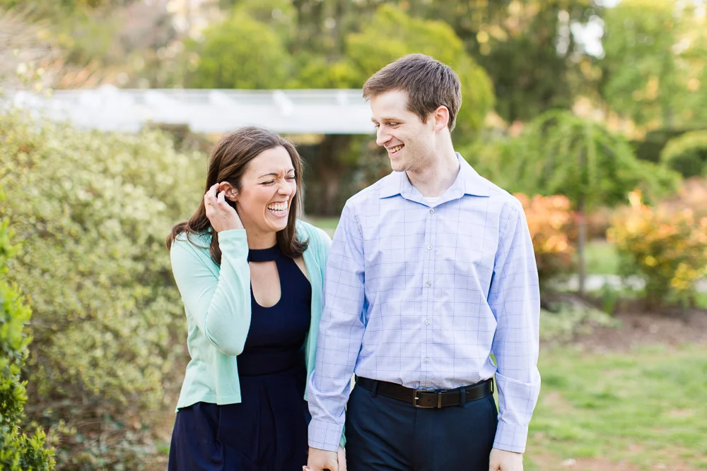 Happy couple laughing during their engagement shoot | Northern Virginia