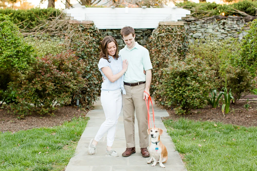 Proud dog parents with their pup in Fauquier County