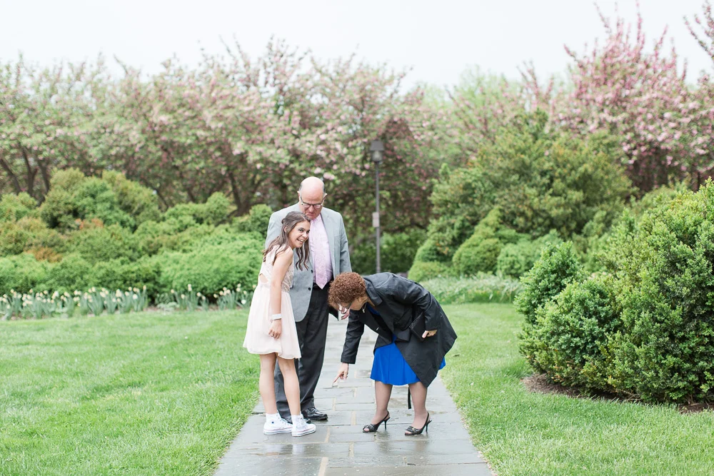 Greeting the guests who are pointing out her fun sneakers