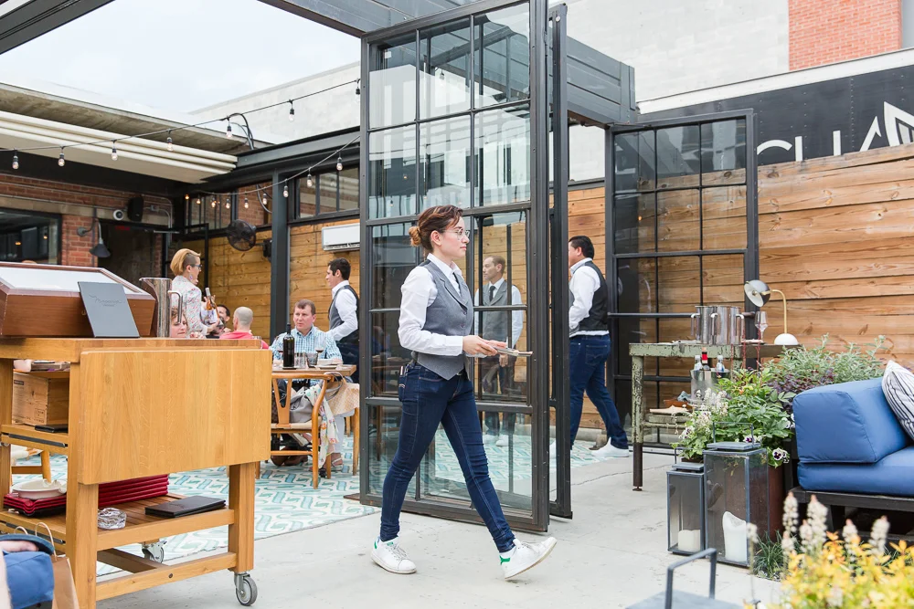 Waitress carrying the “menu”