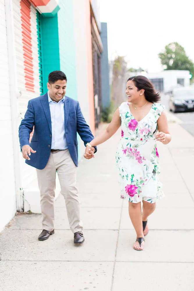 Couple laughing during their engagement session at Union Market | Candid DC Engagement Photographer