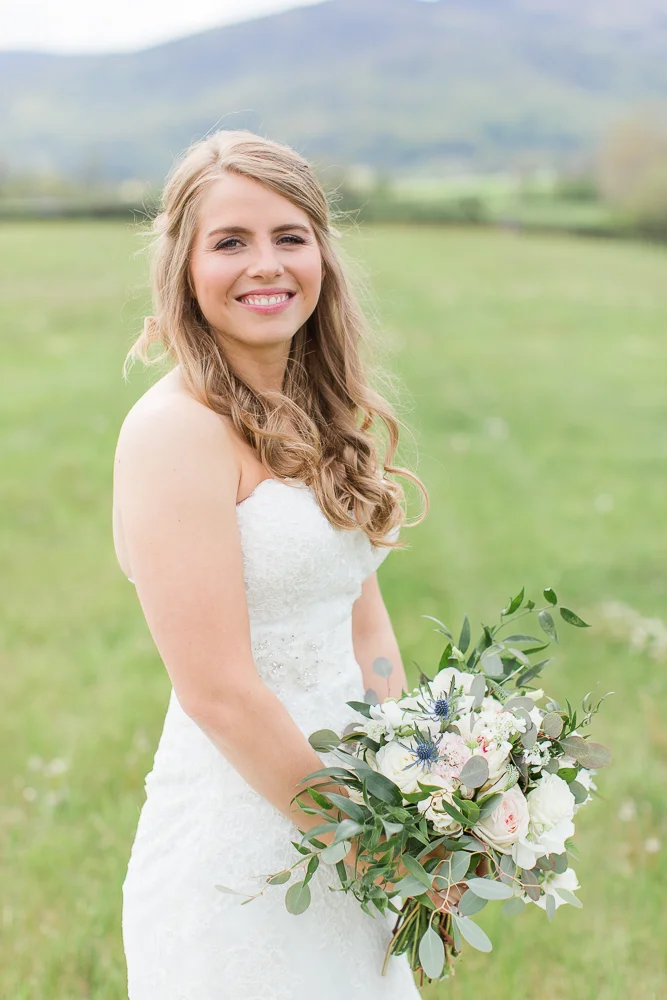 Bridal portrait at King Family Vineyards | Hair and makeup by Glo-Out Glamour Bar | Dress from Ava Laurenne Bride | Flowers from Foxtail Cottage