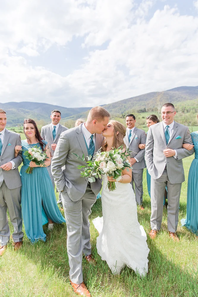 Bride and groom kiss at King Family Vineyards