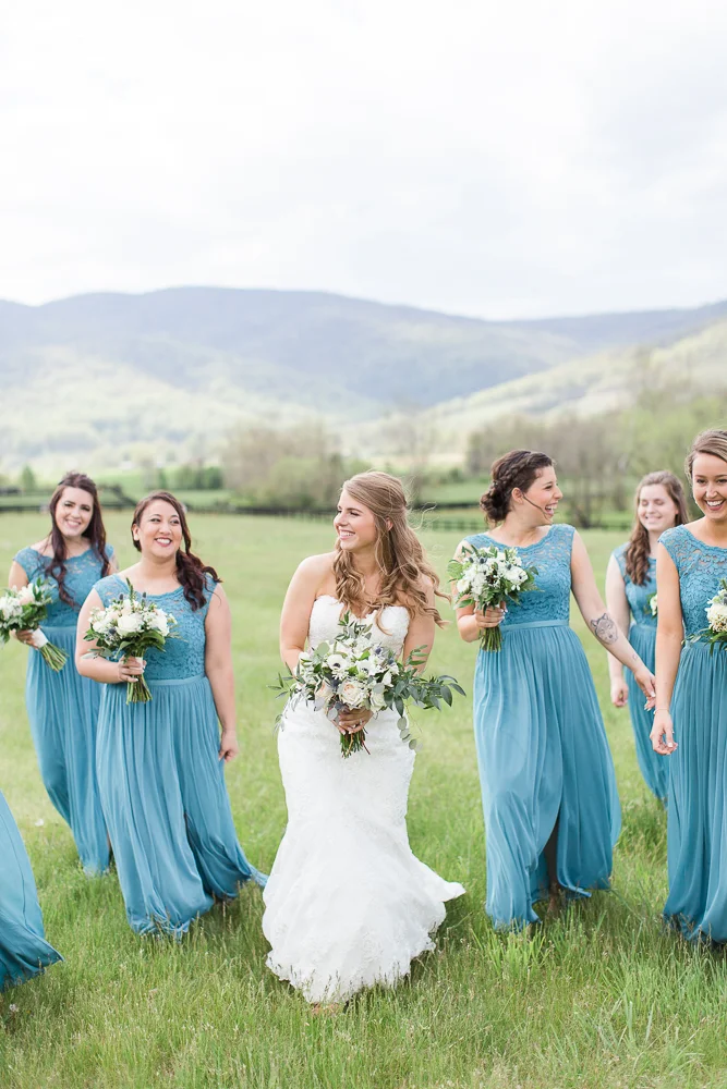 Bride and bridesmaids, with light blue dresses from David's Bridal | Candid Wedding Photographer in Crozet, Virginia | Megan Rei Photography | King Family Vineyards Wedding Photos