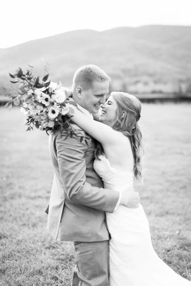 Candid wedding photographer in Crozet, Virginia | Laughing bride and groom at King Family Vineyards