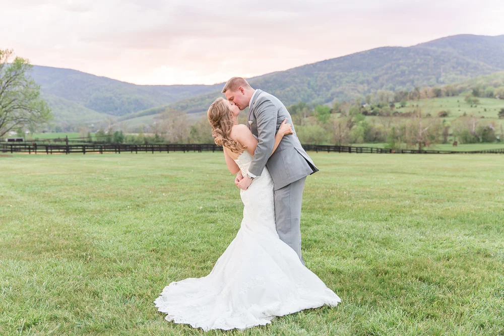 Beautiful sunset wedding photo with Blue Ridge Mountains at King Family Vineyards | Charlottesville Wedding Photographer | Megan Rei Photography