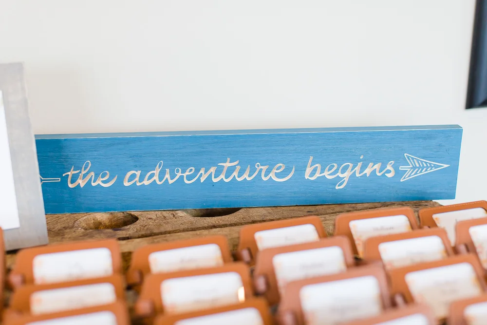 "The adventure begins" wedding signage for wedding reception