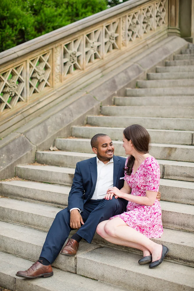 Engagement picture on the staircase at Central Park | New York City Wedding Photographer | Megan Rei Photography
