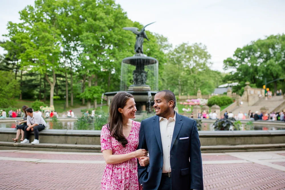 Candid engagement picture by the Bethesda Fountain | Places for engagement photos in Central Park, NYC