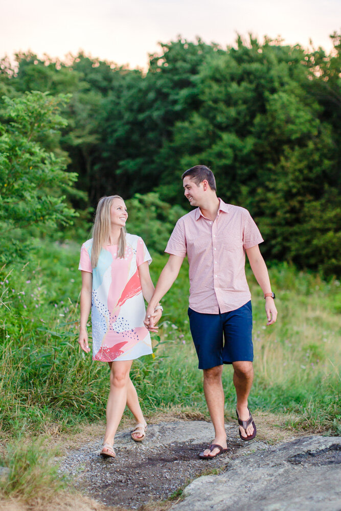 Engaged couple holding hands in Shenandoah