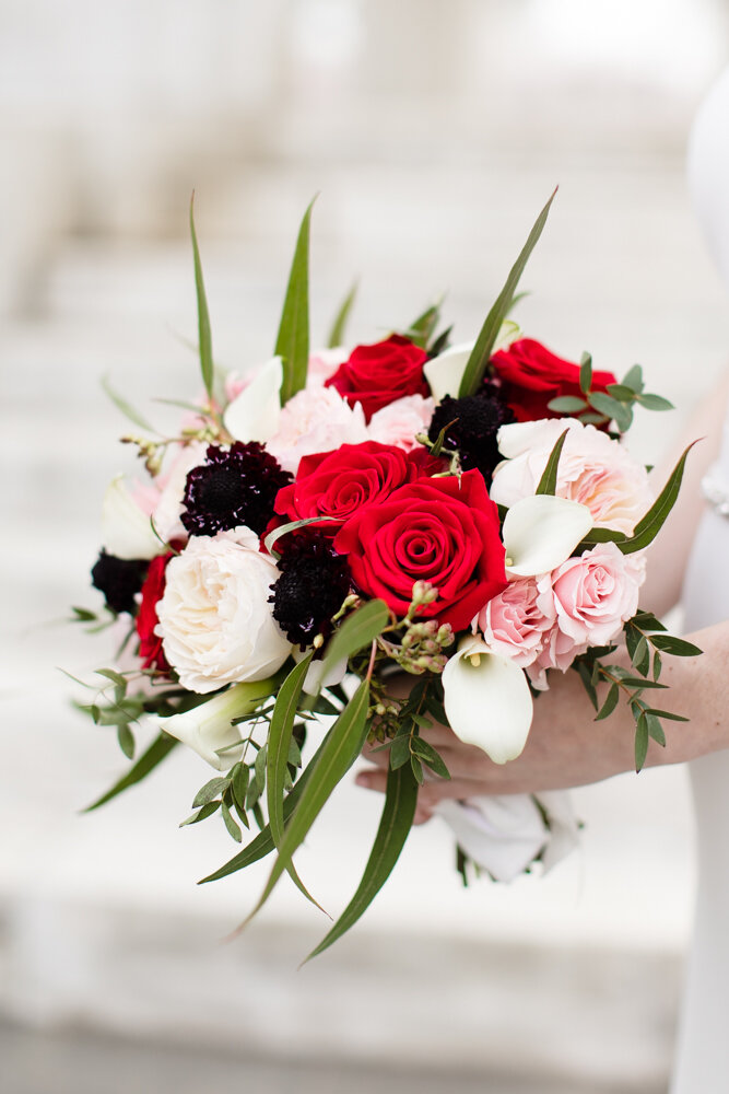 Bold red, white, and pink bridal bouquet