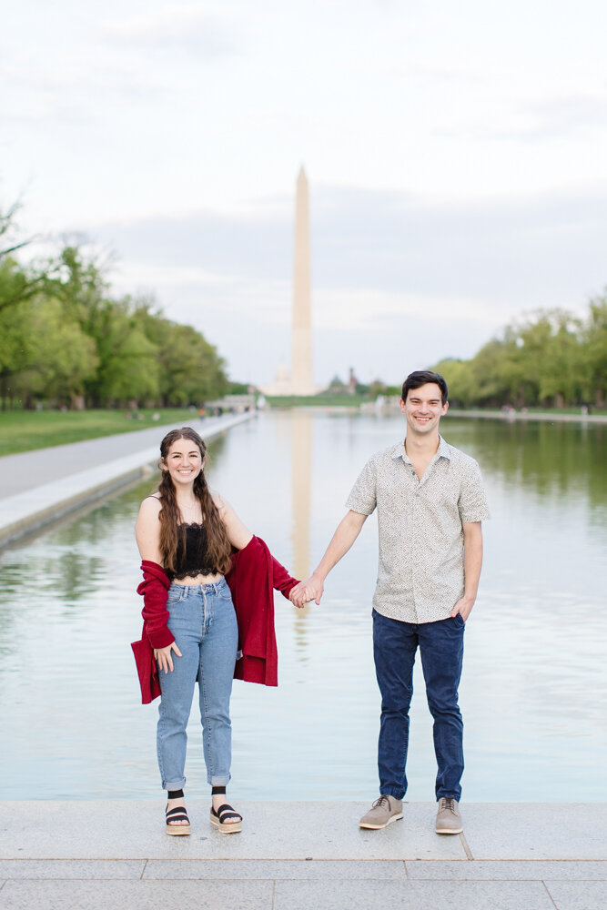Engaged couple at the Reflecting Pool in DC