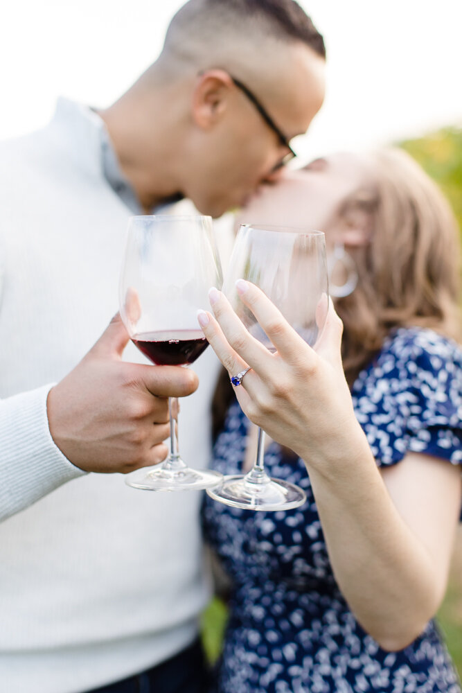 Wine glasses engagement photo