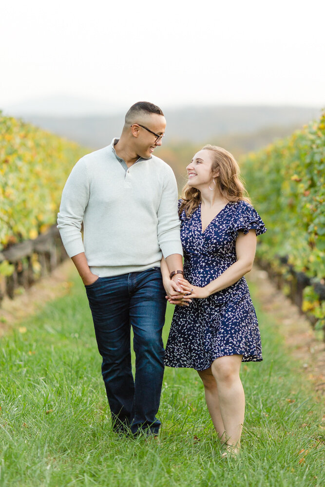 Engagement photos in the vines at Stone Tower Winery