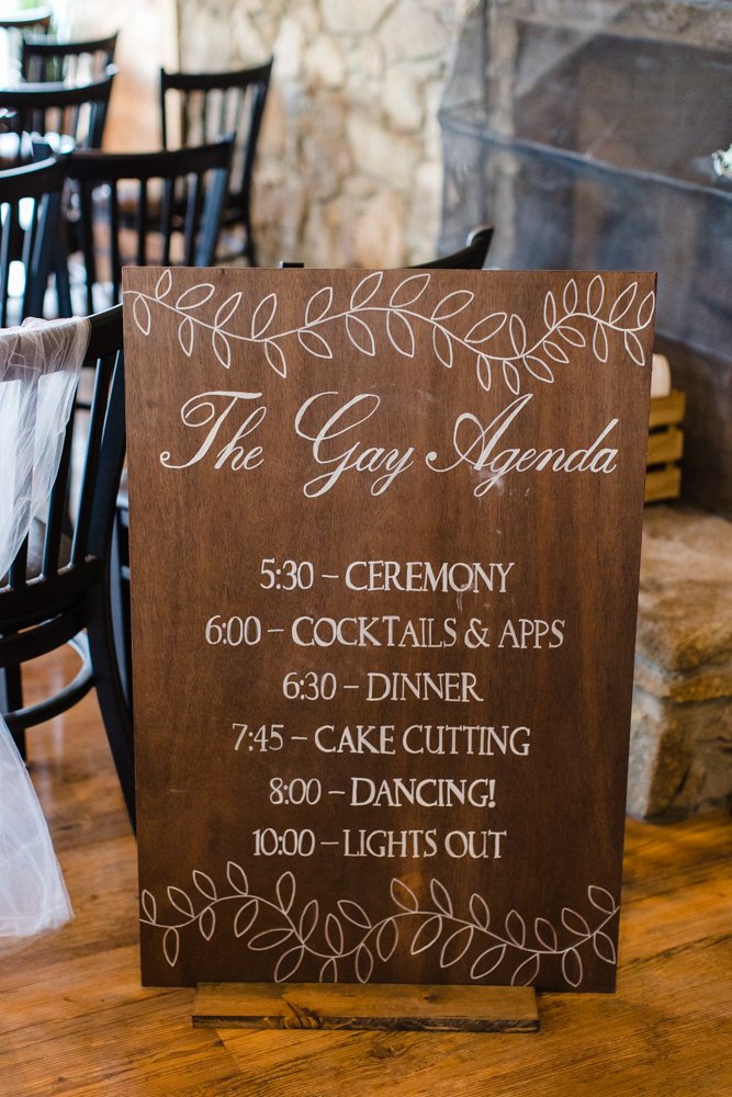 The Gay Agenda sign for LGBTQ wedding