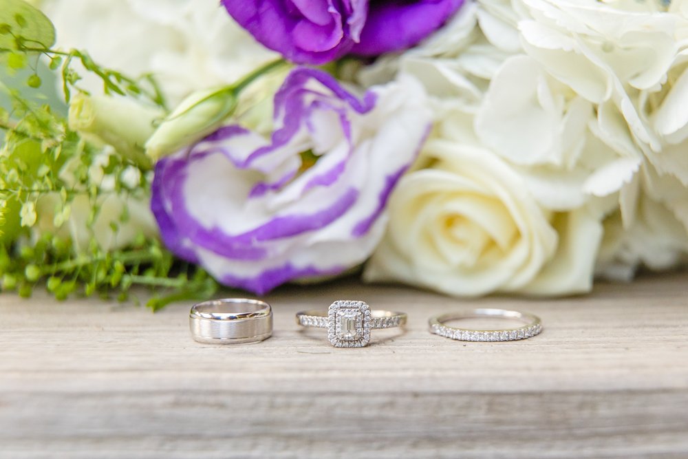 Wedding bands with bouquet