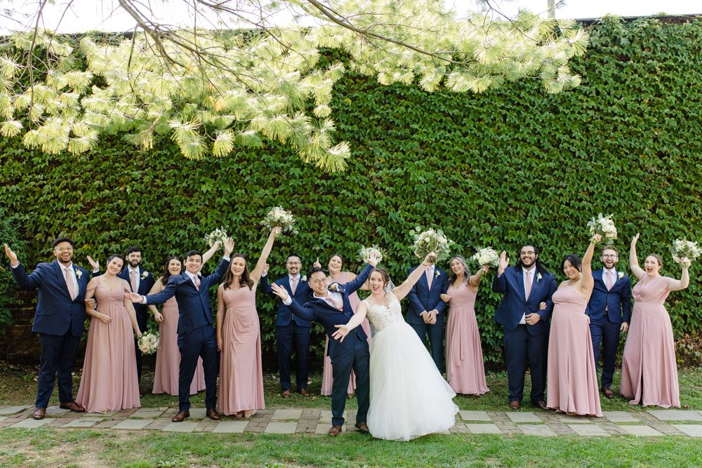 Fun wedding party in navy and blush pink