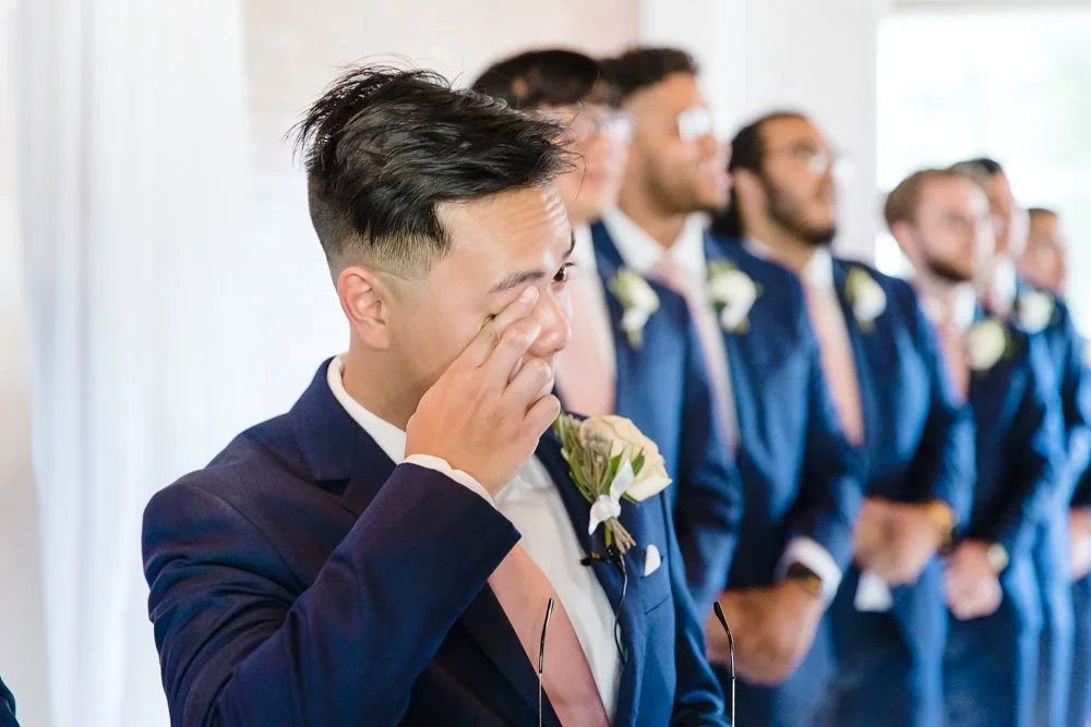 Groom getting emotional as bride walks down aisle