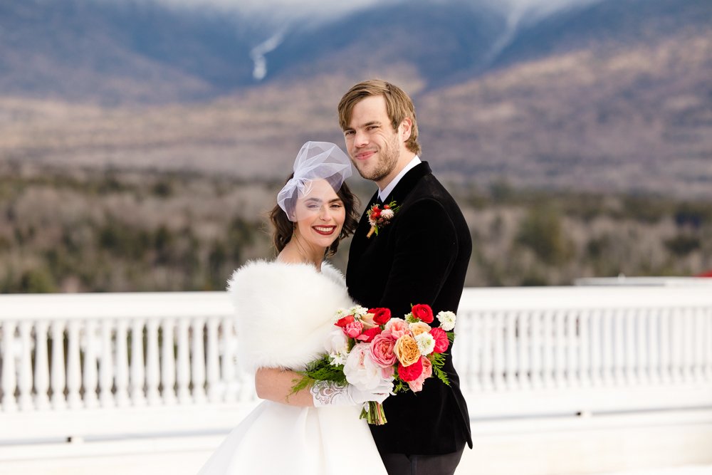 Bride and groom with the White Mountains