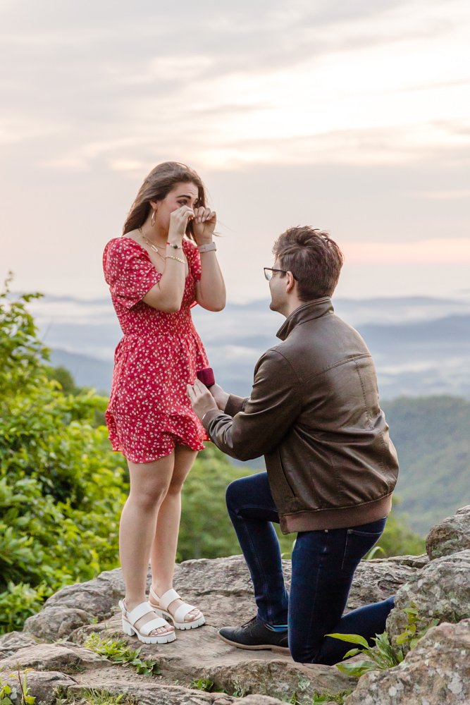Wiping away tears during a surprise proposal on Skyline Drive
