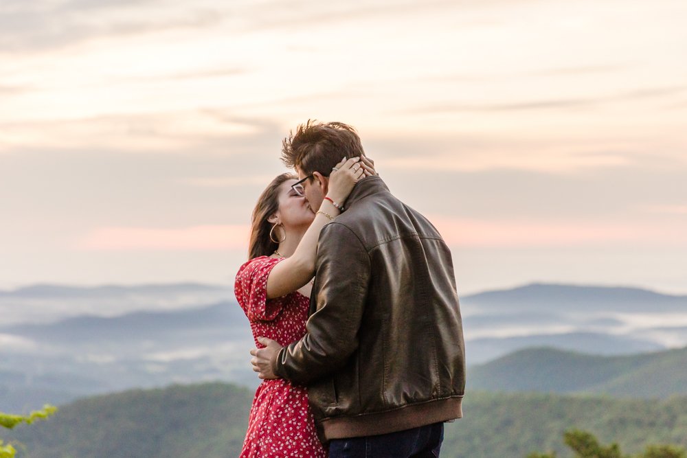Couple kisses after their engagement on Skyline Drive