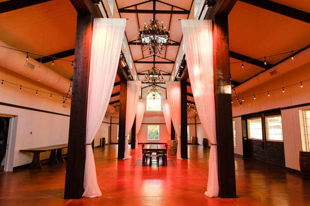 Wedding reception barn with red uplighting in Prince William County