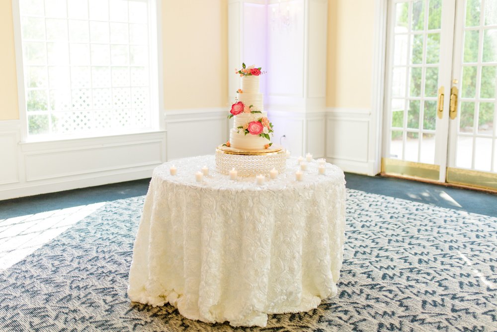 Cake table in the ballroom at Foxchase Manor