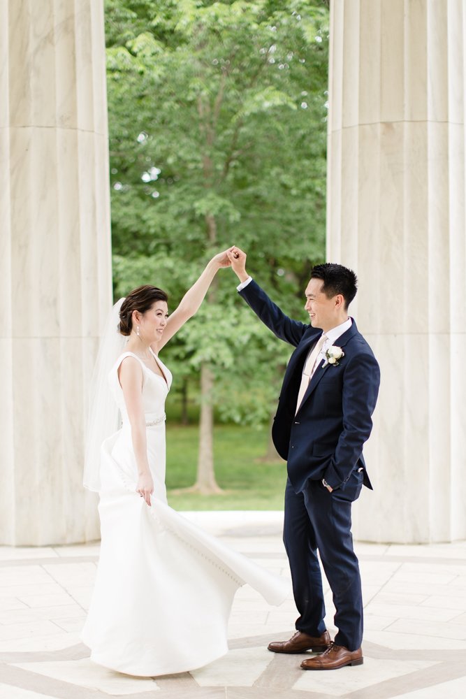 Bride and groom dancing at the DC War Memorial