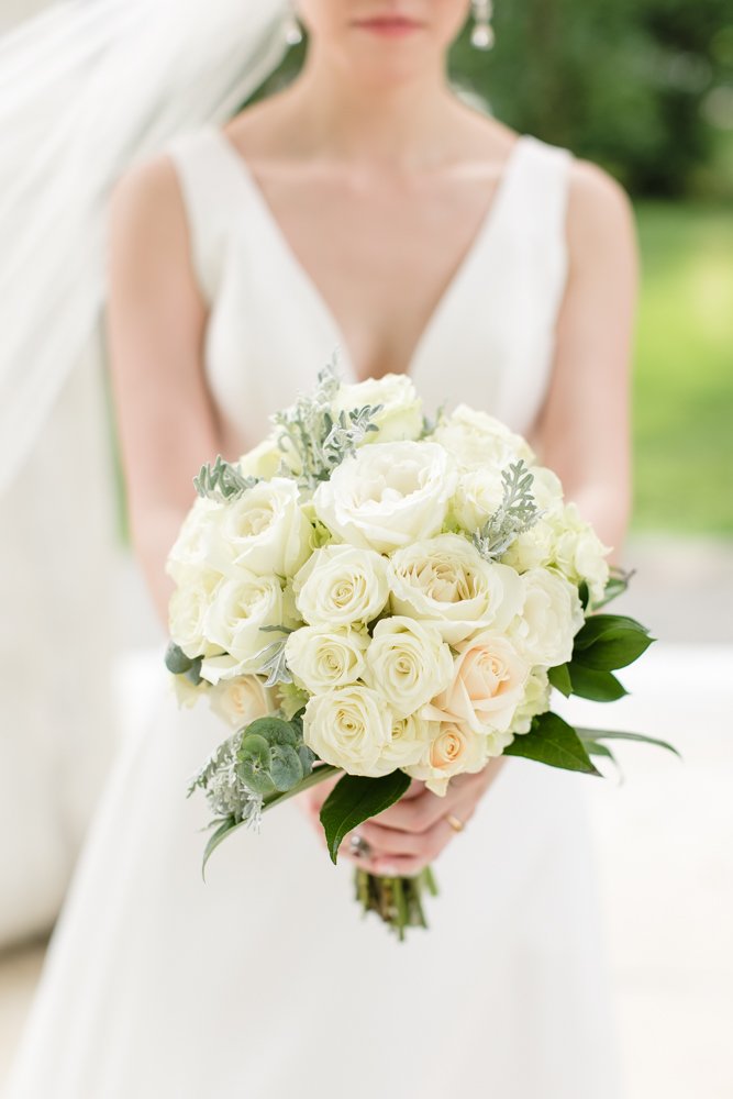 White rose wedding bouquet with greenery