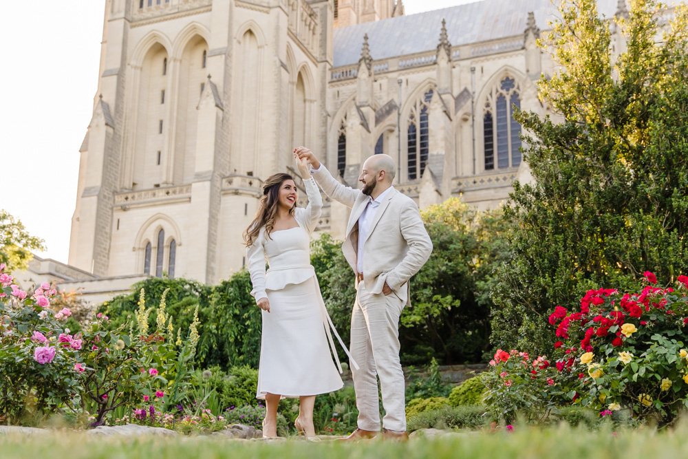 Wedding couple dancing in the garden at the National Cathedral