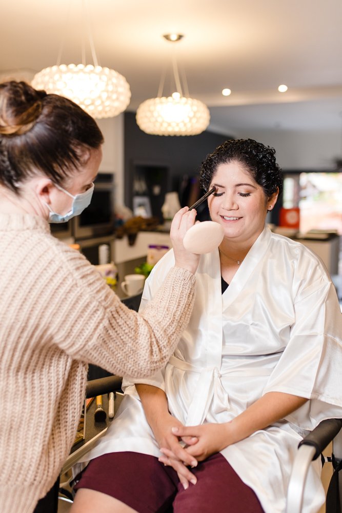 Behind the scenes of Blush Away Makeup during a Virginia wedding day