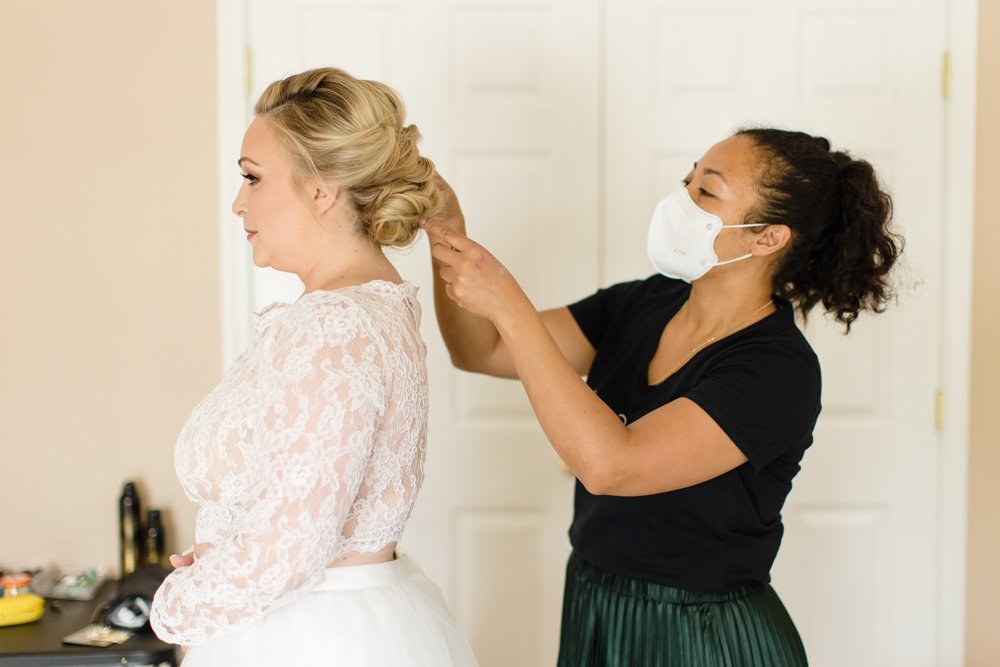 Carla Pressley styling bride's hair on her wedding day