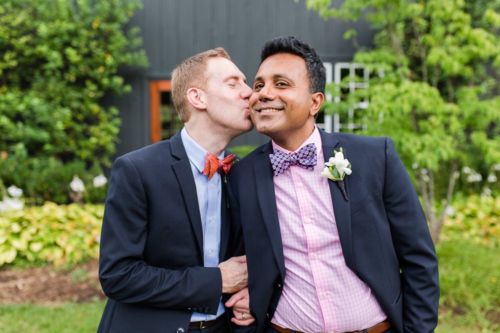 Two grooms kiss at Northern Virginia wedding