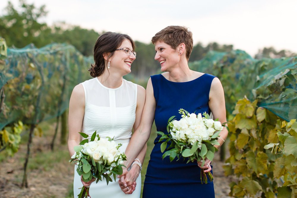 Wedding couple smiling at each other